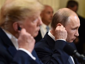 Then-U.S. president Donald Trump, left, and Russian President Vladimir Putin attend a joint press conference in Helsinki, in 2018.