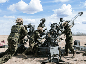 Canadian soldiers fire a M777 howitzer during a training exercise in Wainright, Alberta, April 10, 2019. Canada has sent some of the heavy artillery weapons to Ukraine.