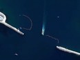 The Russian navy has installed two dolphin pens — the booms are visible at the surface — at the entrance to Sevastopol harbor, just inside the sea wall, shows a review of satellite imagery.