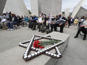 A memorial service is held at the National Holocaust Monument in Ottawa on Sept. 14, 2021, to mark the 80th anniversary of the Babi Yar massacre in Ukraine, in which 33,000 Jewish men, women and children were shot by German SS troops at the edge of a ravine. It marked the beginning of the Holocaust.