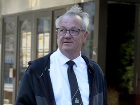 MPP Randy Hiller leaves the Ottawa courthouse after his bail review hearing on Thursday.