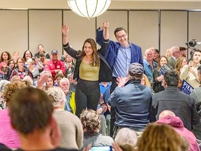 Conservative leadership candidate Pierre Poilievre, centre right, and his wife Anaida, centre left, greet supporters at the Quattro Hotel and Conference Centre during his stopover in Sault Ste. Marie, Ont., on April 22.