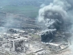 Smoke rises above Azovstal steelworks, in Mariupol, Ukraine.