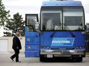 Ontario Progressive Conservative Leader Doug Ford boards his bus as he leaves a press conference at the HVAC-R training facility in Brampton, Ont. Wednesday, May 25, 2022 in Toronto. THE CANADIAN PRESS/Cole Burston