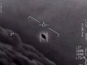 A screengrab from an official video released by the U.S. Department of Defense showing a U.S. Navy pilot encountering "unidentified aerial phenomena" whose origin remains a mystery.