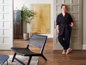 Homeowner Avryll McNair likes the character of the salvaged waffled doors that close off the foyer when it gets messy.