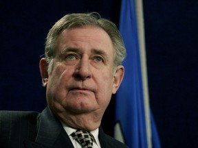 Alberta Premier Ralph Klein addresses a news conference at the legislature in Edmonton, Tuesday, Apr.4, 2006. Under pressure from members of his once fiercely loyal Progressive Conservative party, Klein decided to quit politics earlier than he had planned.