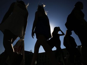 People's silhouette in front of the blue and sunny sky as they visit the Pariser Platz in Berlin, Germany, Thursday, Sept. 15, 2016.&ampnbsp;Canada's auditor general has released a report on the government's use of gender-based analysis plus.
