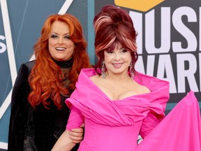Wynonna Judd and Naomi Judd of The Judds attend the 2022 CMT Music Awards at Nashville Municipal Auditorium on April 11, 2022 in Nashville, Tennessee.