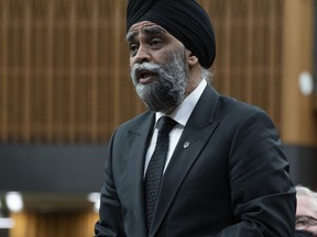 International Development Minister and Pacific Economic Development Agency of Canada Minister Harjit Sajjan rises during Question Period, Monday, April 4, 2022 in Ottawa.&ampnbsp;Harjit Sajjan, the international development minister, says Russia has placed mines in Ukrainian fields to prevent farmers cultivating their crops.