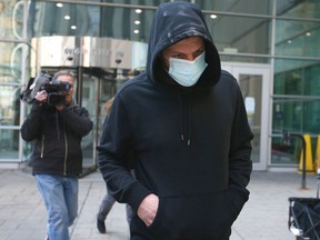 Calgarian Hussein Borhot leaves the Calgary Courts Centre on Thursday, April 28, 2022.