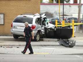 Calgary police are shown at the scene of a shooting/accident at 17 Ave. and 36 St. SE in Calgary on May 11, 2022.