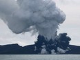 A boat at sea had this view of the smoke rising from the eruption. The Tongan volcano has created a substantial new island since it roared to life in December, spewing huge volumes of rock and dense ash that killed nearby vegetation.