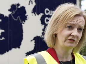 British Foreign Secretary Liz Truss speaks during a visit to McCulla Haulage to discuss the Northern Ireland protocol with businesses, in Lisburn, Northern Ireland, Wednesday May 25, 2022.