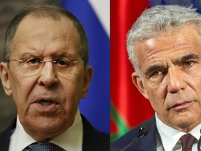 Israeli Foreign Minister Yair Lapid, right, on May 2, 2022, slammed his Russian counterpart Sergei Lavrov for alleging Adolf Hitler may have "had Jewish blood".