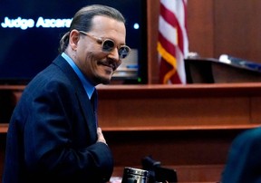 Johnny Depp arrives in the courtroom at the Fairfax County Circuit Court on May 2, 2022.