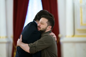 Justin Trudeau embraces Ukraine’s President Volodymyr Zelenskyy on May 8, 2022.