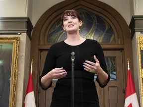 Bloc Quebecois MP Christine Normandin spricht mit Reportern nach der Fragestunde am 3. Mai 2022.