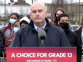 Steven Del Duca makes an announcement on Friday, May 6, 2022.