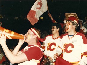 Flames fans cheer after their team beat the Oilers in Game 7 of Smythe Division finals in 1986.