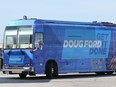 Premier Doug Ford's campaign bus arrives at the Antonino's Original Pizza shop in Tecumseh on Thursday, May 12, 2022. Ford picked up a pizza during the brief photo op. (Windsor Star- Dan Janisse)