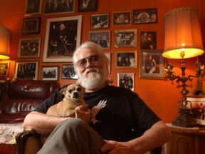 Ronnie Hawkins in his living room at his home, with one of his nine pets, his pal Peanut, at Hawkstone Manor.