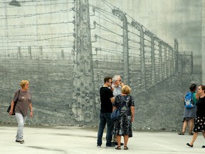 People at the National Holocaust Monument in Ottawa.