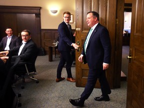 Jason Kenney enters the room prior to a cabinet meeting in Calgary on May 20, 2022, a day after he announced that the was stepping down as UCP leader.