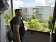 Anton Semenov, who owns a company which produces bulletproof vests and other military equipment visiting his mother’s apartment, which had been empty for weeks, to see if it was intact. Adam Zivo/National Post