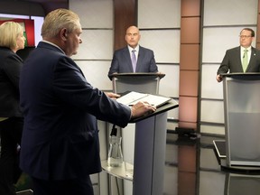 From left: Ontario PC Party Leader Doug Ford, Ontario NDP Leader Andrea Horwath, Ontario Liberal Party Leader Steven Del Duca and Green Party of Ontario Leader Mike Schreiner during the Ontario party leaders’ debate, in Toronto, May 16, 2022.