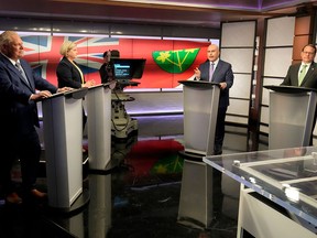 Progressive Conservative Leader Doug Ford, left to right, NDP Leader Andrea Horwath, Liberal Leader Steven Del Duca and Green Leader Mike Schreiner square off during the Ontario party leaders' debate in Toronto on May 16, 2022.