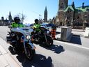 Police patrol Wellington Street in Ottawa prior to the arrival of the 