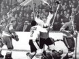 Paul Henderson is embraced by Team Canada teammate Yvan Cournoyer after scoring the winning goal in the 1972 Summit Series between Canada and Russia.