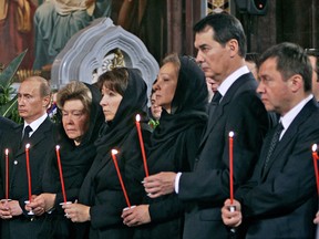Russian President Vladimir Putin, far left, and Valentin Yumashev, far right, at former Russian president Boris Yeltsin's funeral in Moscow April 25, 2007.