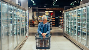 lonely man shopping in grocery store aisle