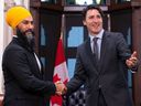 NDP Leader Jagmeet Singh and Prime Minister Justin Trudeau shake hands on March 24, 2022, shortly after sealing a deal in which the NDP would support the minority Liberals for the remainder of the term.
