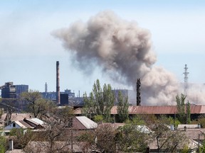 Smoke billows from an explosion at the Azovstal Iron and Steel Works during Ukraine-Russia conflict in the southern port city of Mariupol, Ukraine May 8, 2022.