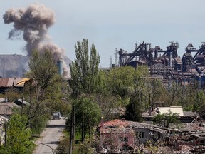 A view shows an explosion at a factory of Azovstal Iron and Steel Works during the Ukraine-Russia conflict in the southern port city of Mariupol, Ukraine May 8, 2022. REUTERS/Alexander Ermoshenko