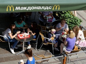 FILE PHOTO: People rest at a McDonald's restaurant in central Moscow, Russia, June 30, 2016.