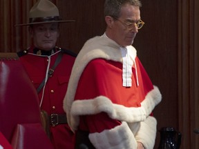 Supreme Court Justice Nicholas Kasirer takes his seat on the bench during an official welcome ceremony in Ottawa, Monday November 4, 2019.