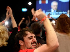 Supporters react to election updates as Anthony Albanese, leader of Australia's Labor Party.