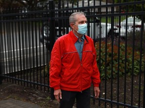 A man who identified himself as Richard Demontigny arrives at Premier John Horgan's constituency office in Langford, B.C., on Monday, May 30, 2022, before turning himself in to RCMP after fresh manure was dumped at the community office last week to protest for saving old-growth forest on Vancouver Island.