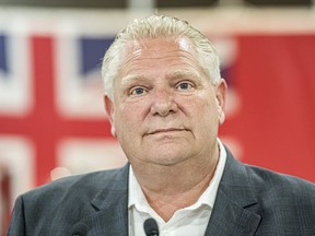 Ontario Premier Doug Ford makes a campaign stop at the Finishing Trades Institute of Ontario, in North York, Ont., on Tuesday, May 17, 2022. The Supreme Court of Canada will not hear an appeal from a former high-ranking Ontario Provincial Police officer over his bid to sue Premier Doug Ford for defamation.