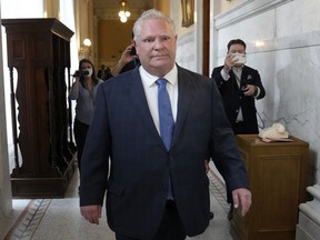 Ontario Premier Doug Ford walks towards Lt.-Gov. Elizabeth Dowdeswell's office at Queen's Park in Toronto on May 3, 2022.