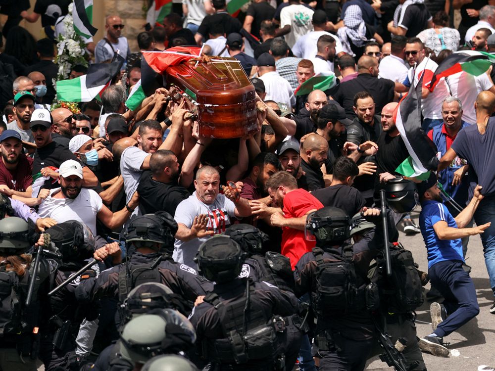 Israeli police beat mourners at funeral of slain Palestinian Al Jazeera ...