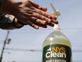 A member of the New York Army National Guard uses NYS Clean, a hand sanitizer created by the New York State.