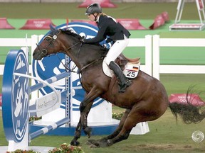 Annika Schleu of Germany is stymied by a balking horse during  the Modern Pentathlon competition at Tokyo 2020 Olympics, August 6, 2021. Her coach later punched the horse, called Saint Boy.