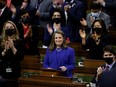 Deputy Prime Minister Chrystia Freeland receives a standing ovation from her own party, in the House of Commons in Ottawa, on April 7.