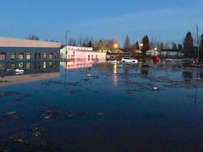 Flooding is shown in Hay River, N.W.T., on Wednesday, May 11, 2022. A town in the Northwest Territories says people will be allowed to return to their homes starting Sunday evening, three days after about 3,500 had been ordered to evacuate as water rose to dangerous levels caused by flooding.