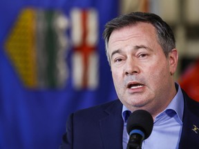 Alberta Premier Jason Kenney speaks at a news conference in Calgary on March 25, 2022. Kenney is to learn today if he still has enough support from his party to stay on as leader.
